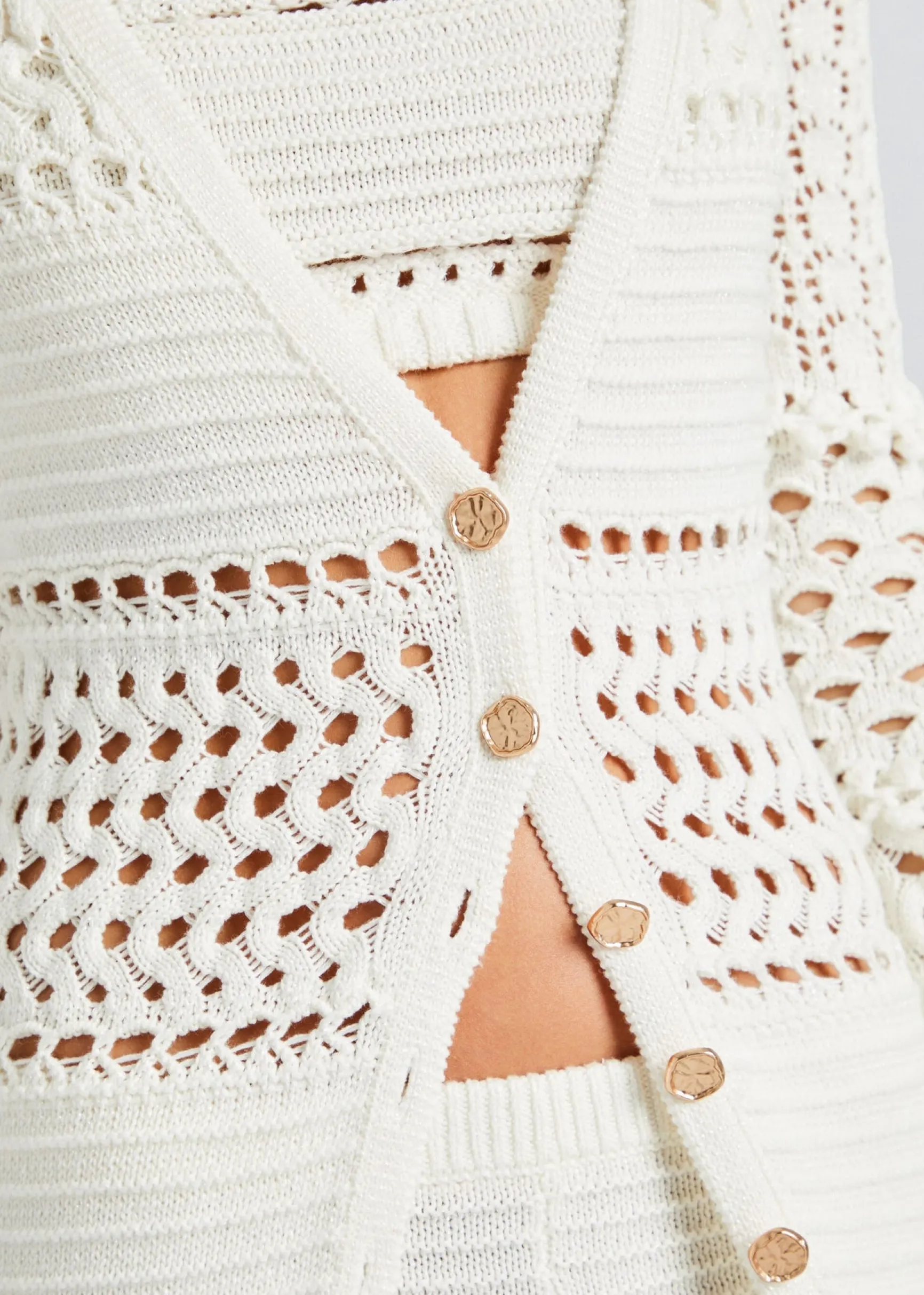 alaia_knit_crochet_cardig_1-3.webp Resort '24*Retrofete Alaia Knit Crochet Cardigan Iridescent White