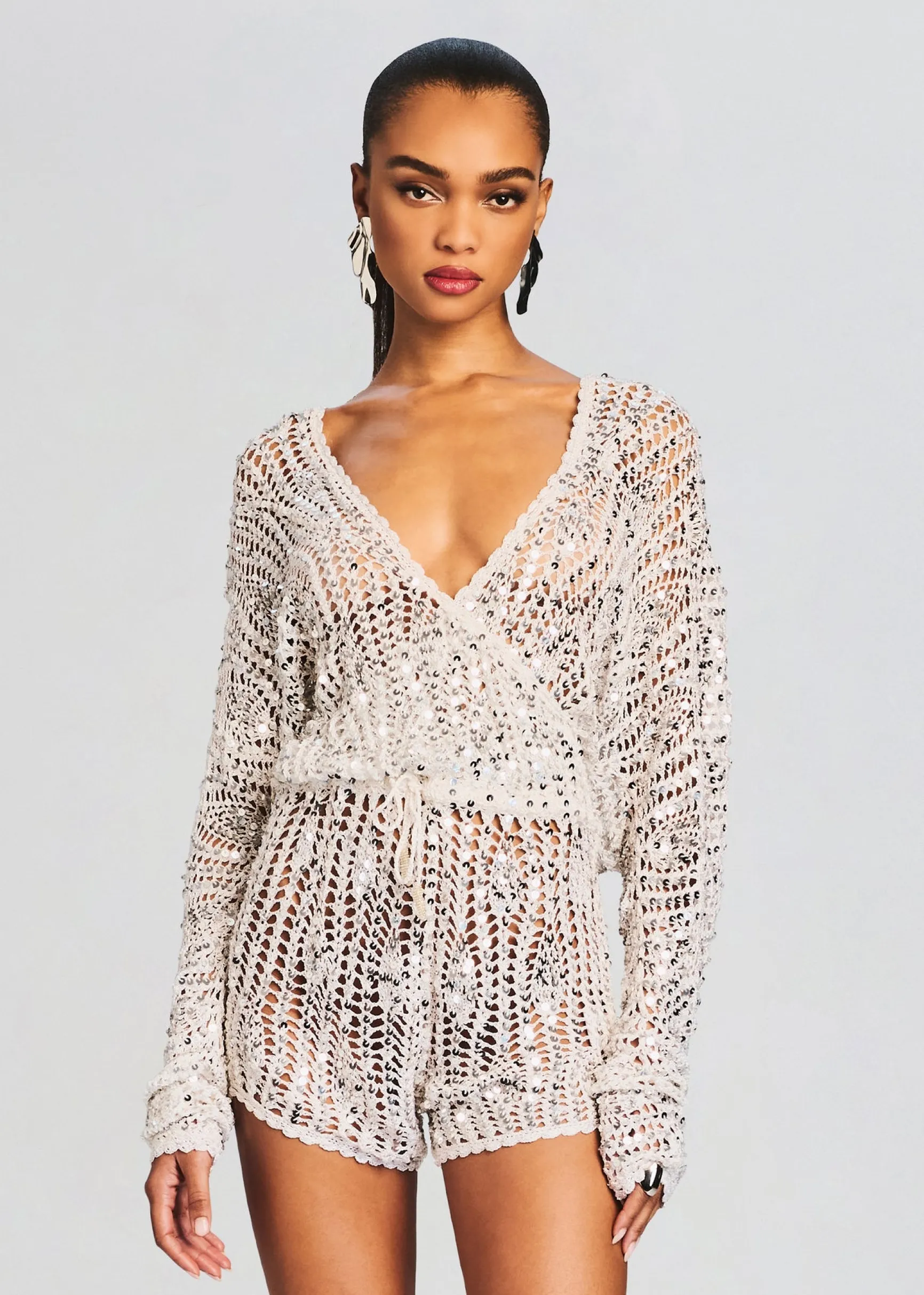 meadow_sequin_crochet_rom_1.webp Sequin Styles*Retrofete Meadow Sequin Crochet Romper White/Silver